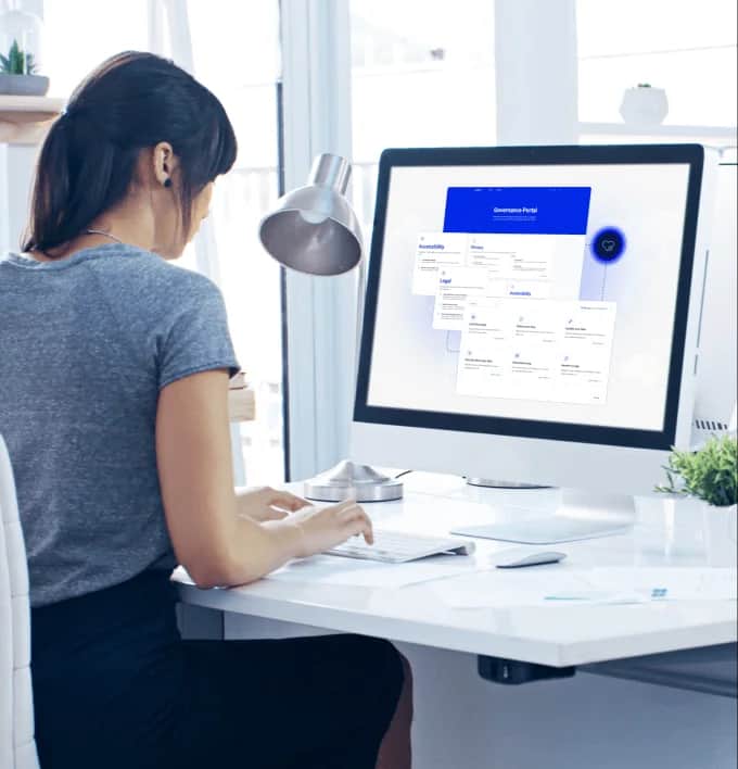 Woman sitting in front of computer